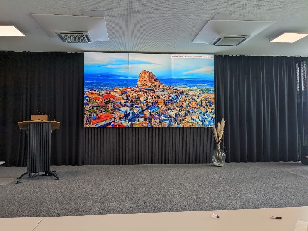 EventSpace with a large video wall at GlessHub