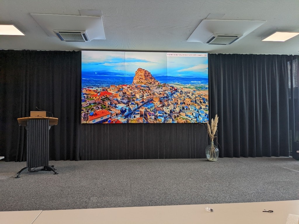 EventSpace with a large video wall at GlessHub